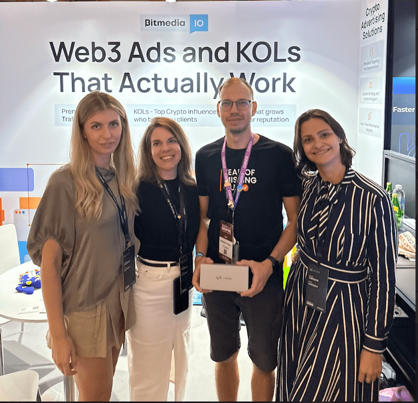 Bitmedia team with the winner of the giveaway
